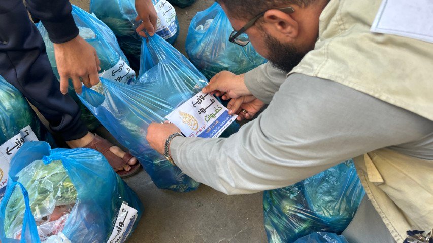 توزيع طرود ( سلة خضار) + سقيا ماء979